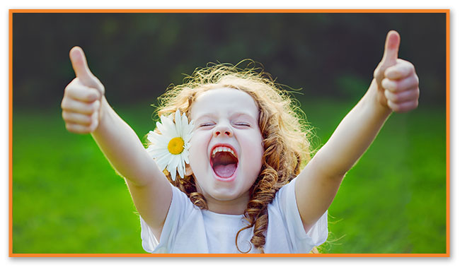 Girl with Two Thumbs Up at Montclair Pediatric Dental Care Near Bloomfield